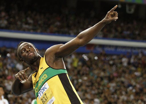 Usain Bolt gesticula tras ganar los 200 metros del Mundial de atletismo en Daegu, Corea del Sur, el sábado 3 de septiembre de 2011. Foto: Matt Dunham/AP