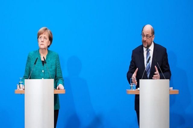 Angela Merkel y el líder del Partido Socialdemócrata, Martin Schulz